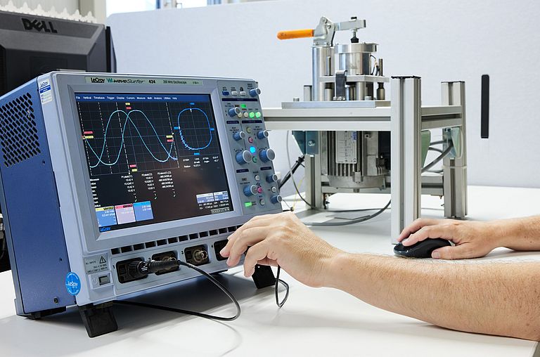SSM employee conducting motor quality check to ensure all components meet high standards for optimal performance.