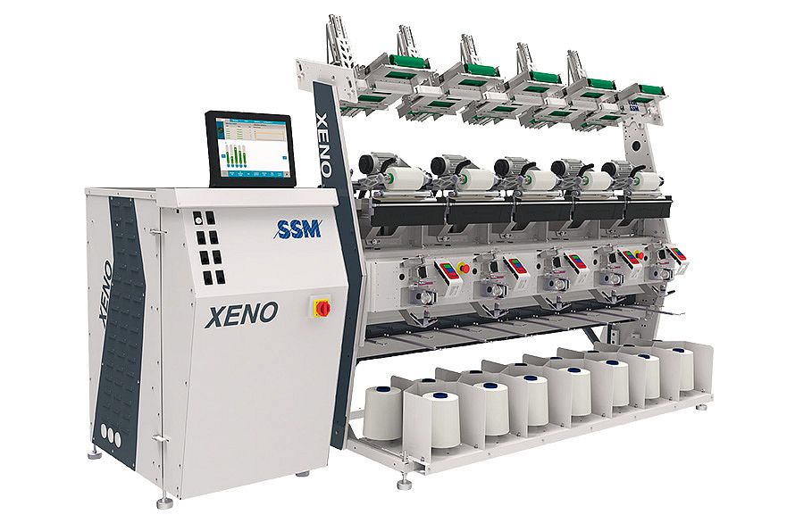 XENO-YD precision assembly winder for staple and filament yarns, featuring advanced technology and option to add elastane during assembly.